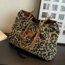 Opal - Leopardprint håndtaske med struktureret design