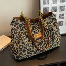 Opal - Leopardprint håndtaske med struktureret design