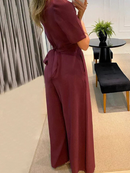 Abigail - Elegant jumpsuit med vide ben og V-hals