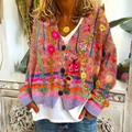 Lina - Løstsiddende sweater med knapdetaljer og dyb