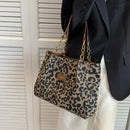 Opal - Leopardprint håndtaske med struktureret design