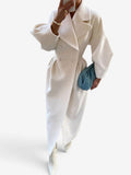Buttonlap -Trenchcoat med knaplukning og reverskrave