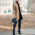 Langærmet trenchcoat med et afslappet elegant look