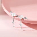 Riley - Elegant ørering med blomsterkvast og unikt design