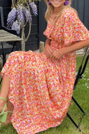 Ruth - Stilfuld plisseret V-hals kjole med blomsterprint