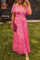 Ruth - Stilfuld plisseret V-hals kjole med blomsterprint