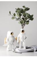 SpaceFlora - Astronautvase med bageste blomsterrum og