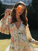 Maya - Stilfuld Minikjole med Blomsterprint, V-hals & Lange