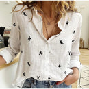 Skylar - Knap-op bluse med fugleprint og afslappet pasform