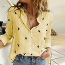Skylar - Knap-op bluse med fugleprint og afslappet pasform
